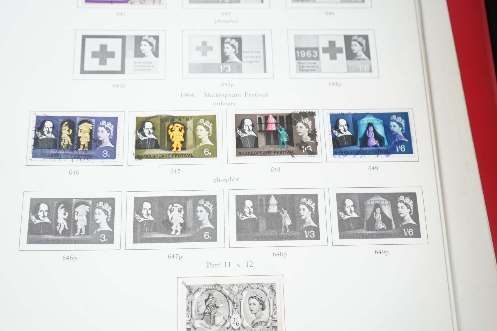 Four stamp albums including a first day cover album